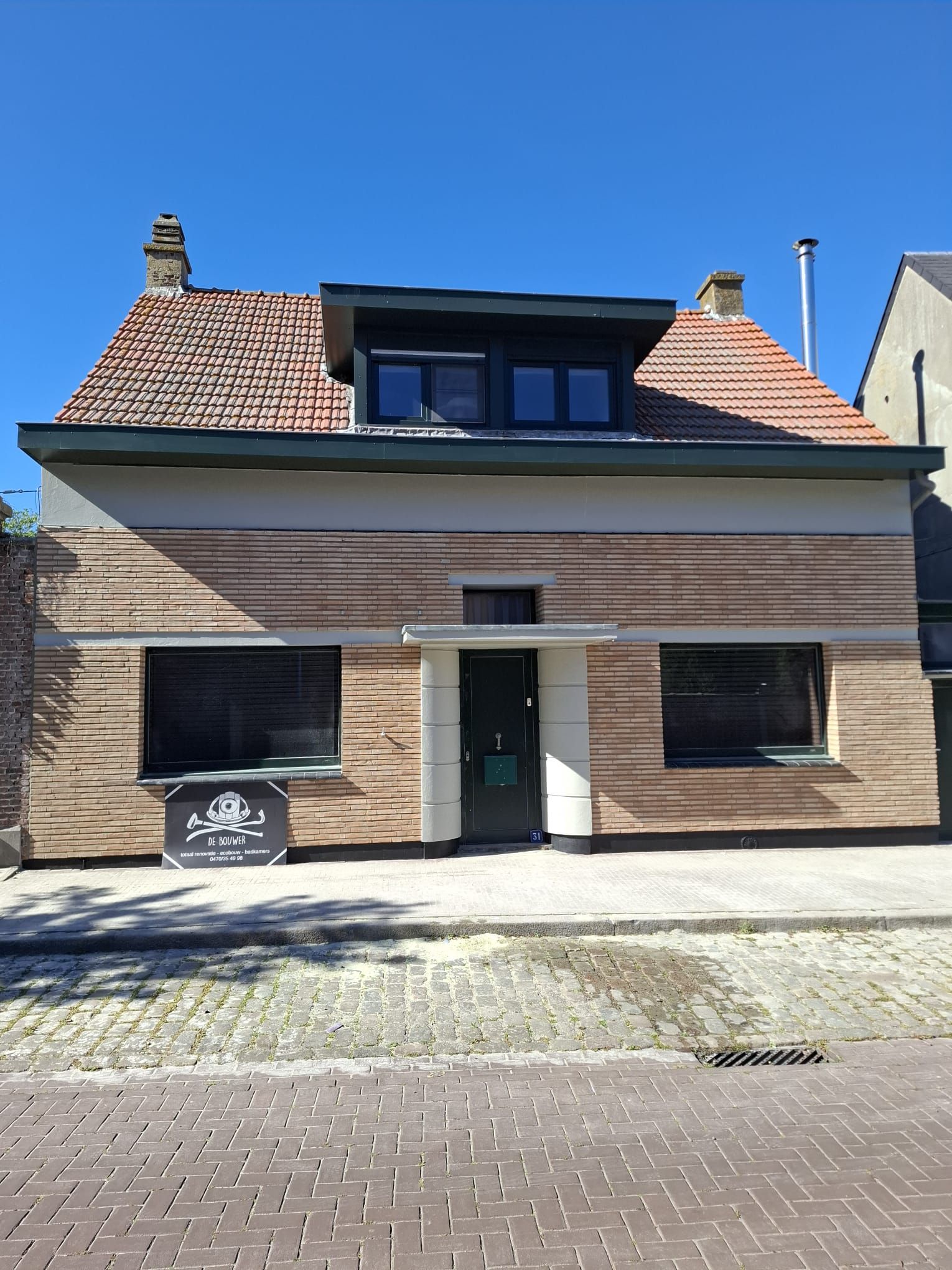 Afgewerkte gevel na de renovatiewerken