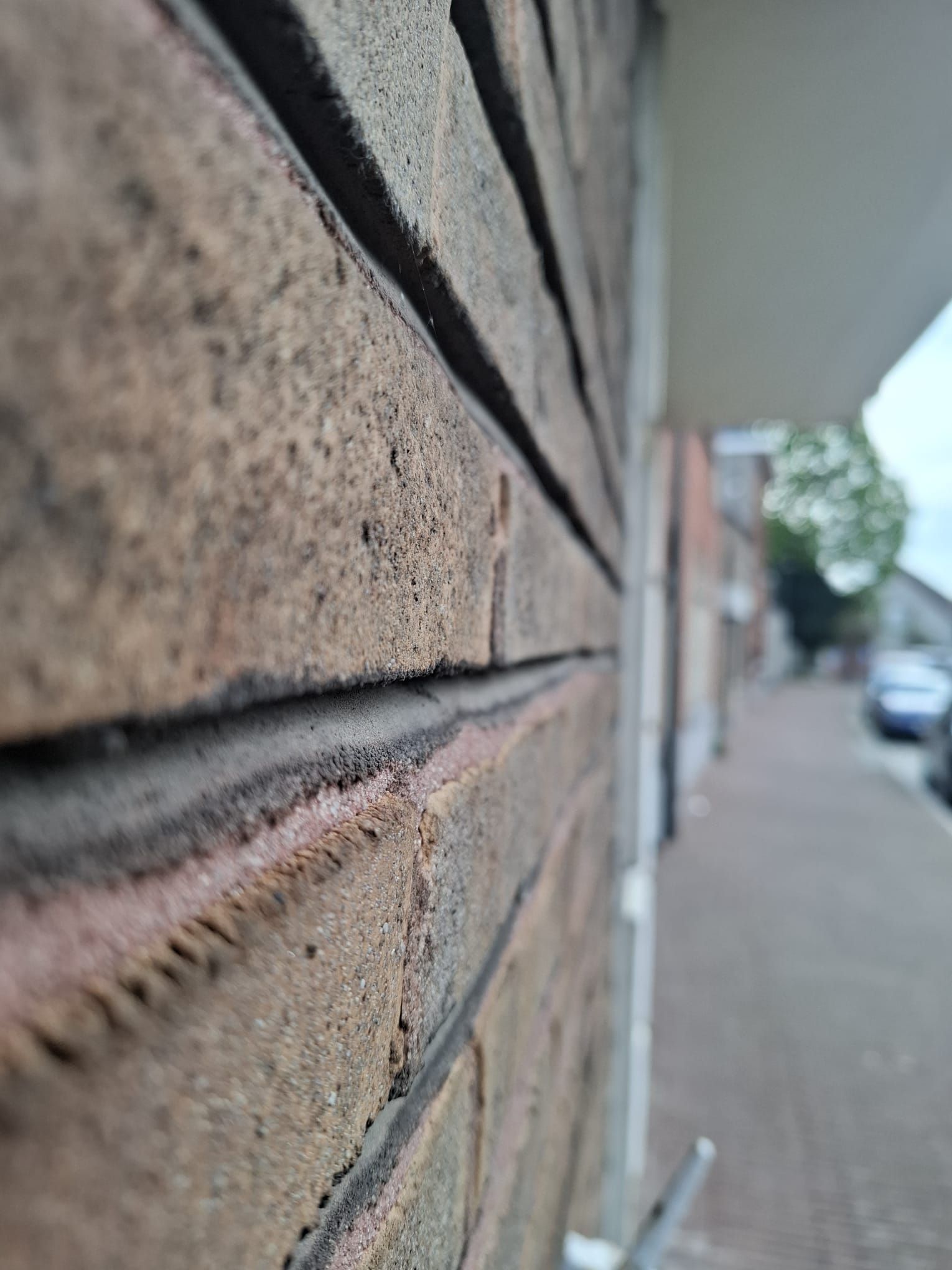Detail van de afgewerkte gevel
