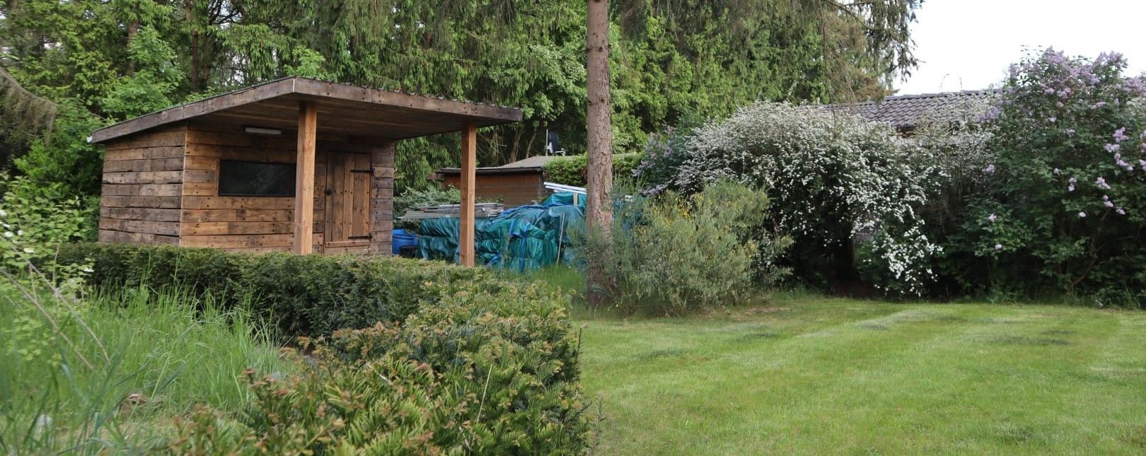 Houten tuinhuis gemaakt van reclaimed wood