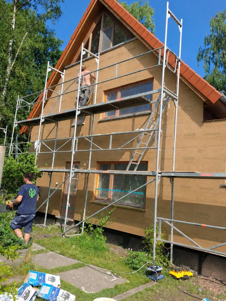 Woning met kalkbezetting als natuurlijke gevelafwerking